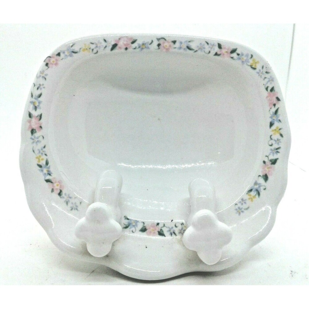 Porcelain White Pedestal Sink with Flowers around the Base and Basin